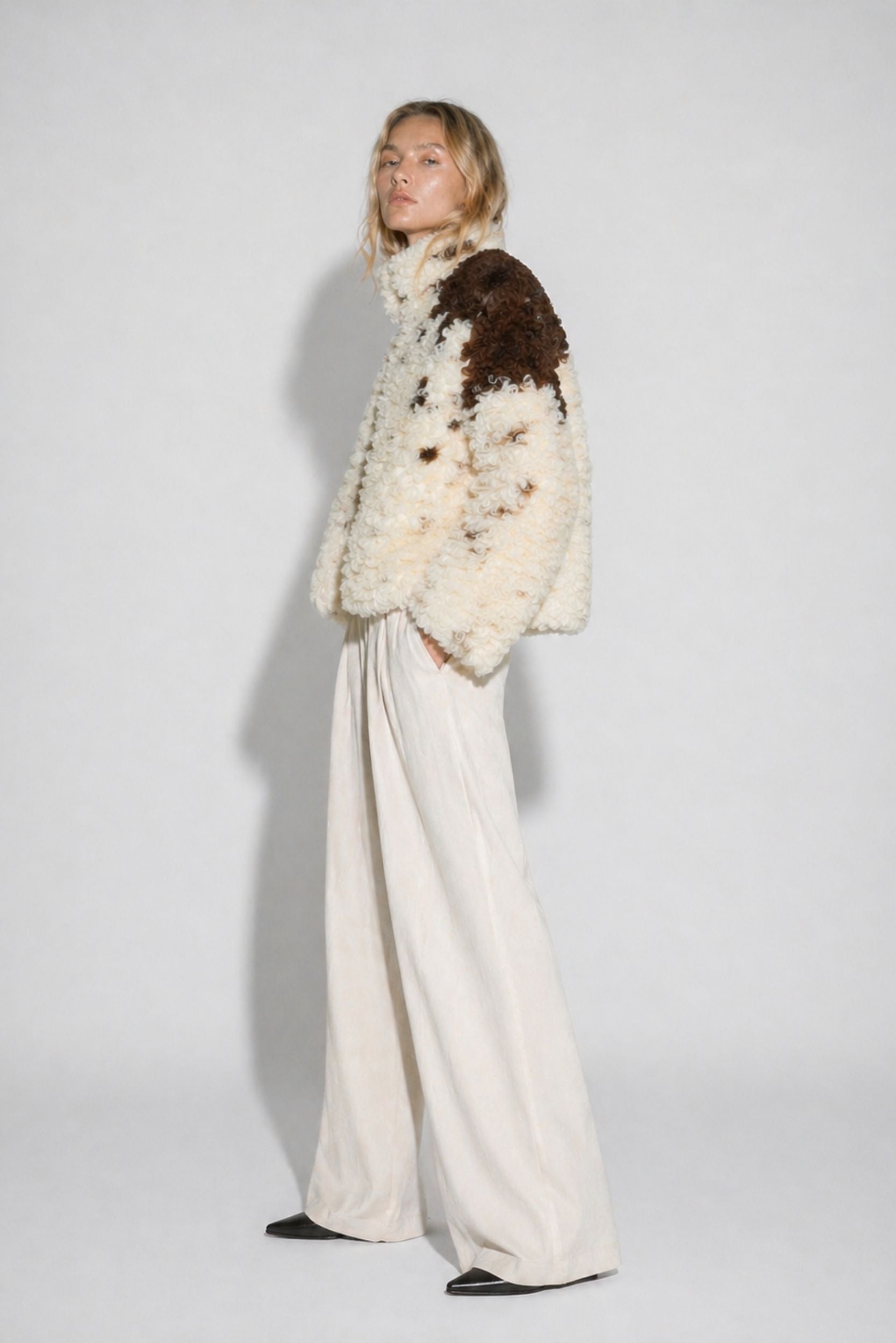 Shearling sheep wool jacket for women with contrast texture by TOMBÉ STUDIOS 