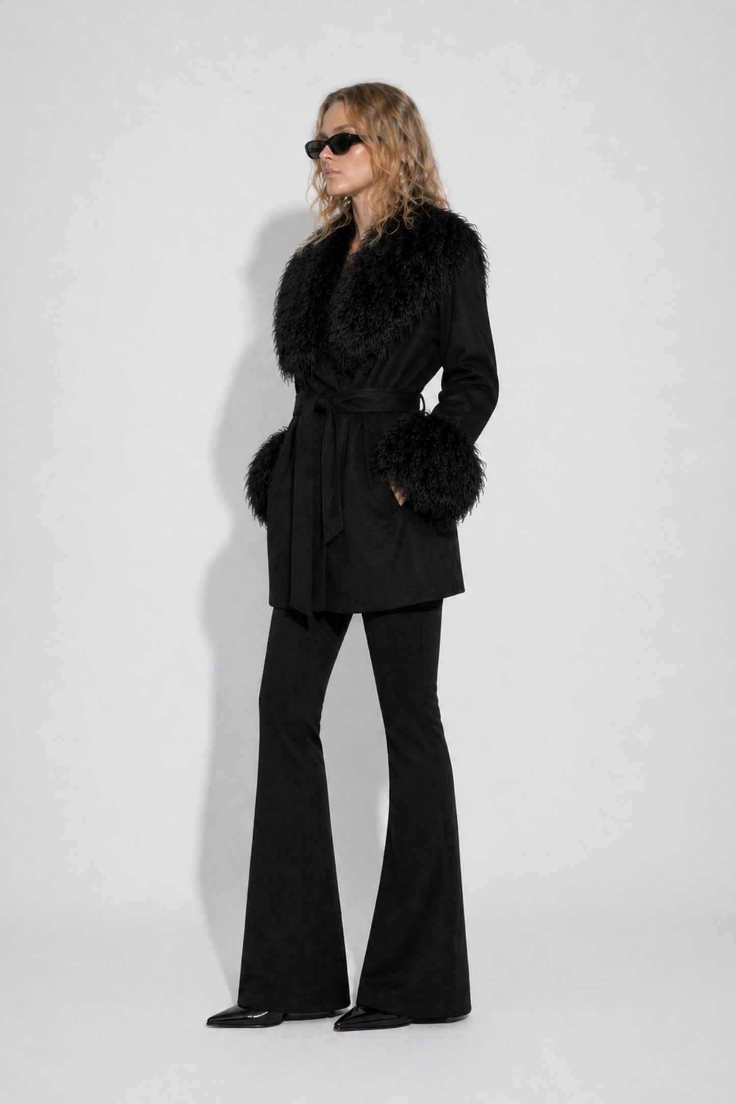 Black cashmere wool jacket with Mongolian cuffs and collar by TOMBE STUDIOS
